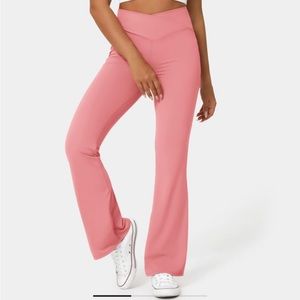 HALARA High Waisted Crossover Flare Leggings. Size: L (petite);color: Candy Pink